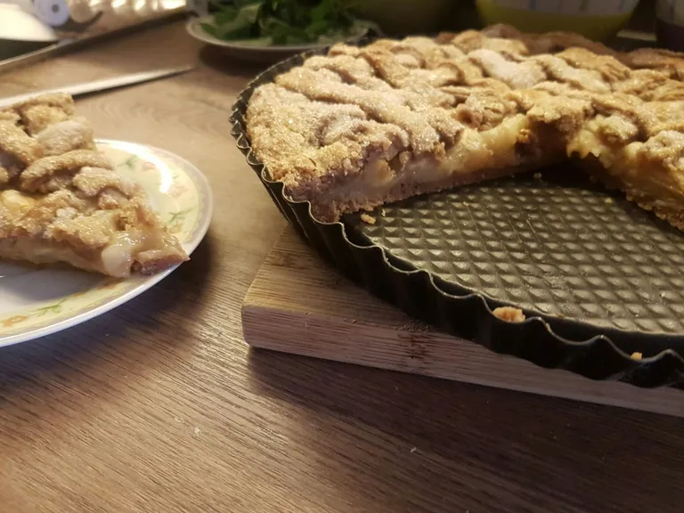 Baked pie with a huge slice taken out